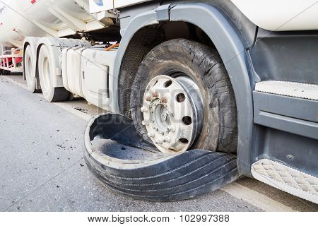 Closeup Damaged 18 Wheeler Semi Truck Burst Tires By Highway Street.
