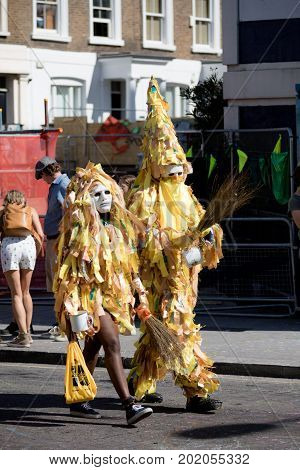 London United Kingdom - August 27 2017. Notting Hill Carnival one of the largest street parties in Europe is now in its 51st year. This year was close to the ruin of Grenfell Tower scene of a devastaing fire.