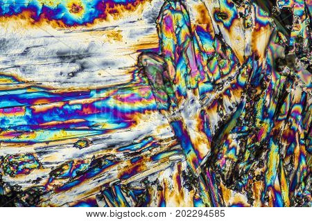 microscopic shot of urea micro crystals in polarized light