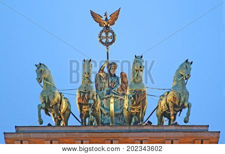 part of Brandenburg Gate Berlin famaous sculpture Quadriga at dusk