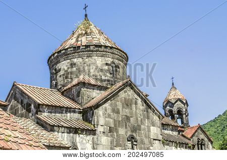 View of the round dome of the Gregory the Illuminator's temple with an openwork cross in the monastery of Haghpat