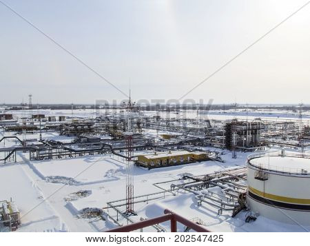 The Industrial Facility Of The Oil Company. Oilfield Equipment. Industrial Oil And Gas Infrastructur
