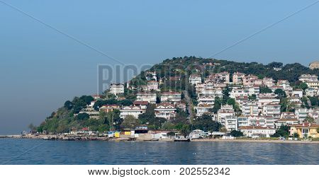 Istanbul, Turkey - April 27, 2017: View of Kinaliada island from the sea with summer houses. One of four islands named Princes Islands in the Sea of Marmara near Istanbul Turkey