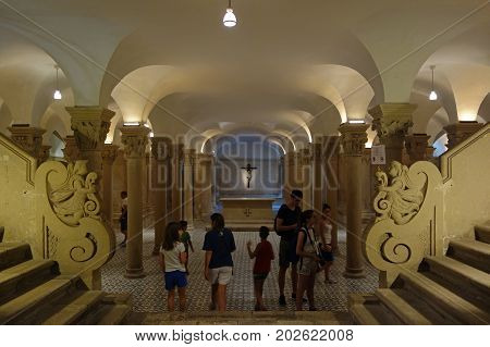 LECCE ITALY - JULY 27 2017: People in the Crypt under the Duomo dell Assunta Cathedral