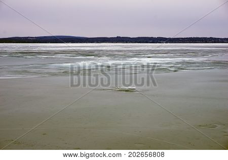 A view of ice-covered Little Traverse Bay, from the beach in Wequetonsing, Michigan, during March.