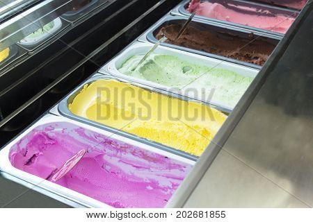 classic italian gourmet gelato gelatto ice cream display in shop.