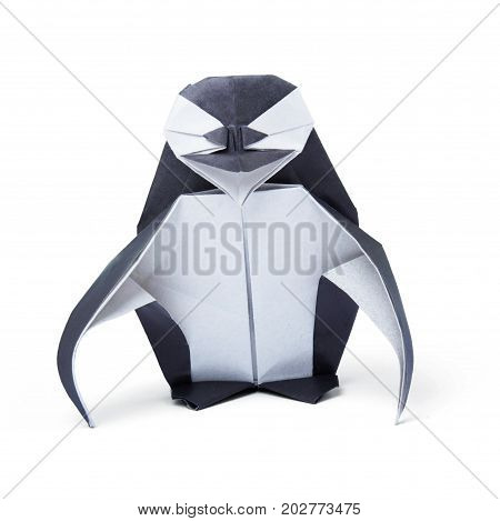 Penguin origami paper on a white background