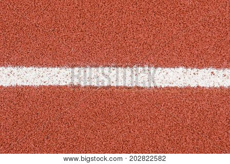 The running track rubber lanes cover texture with line for background.
