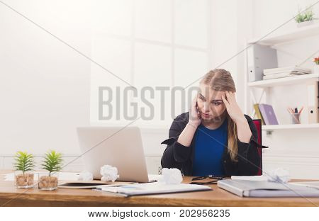 Tired pregnant businesswoman at office copy space. Expectant business lady feeling sick at work, gestosis concept