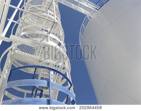 The Tank With Water And A Ladder.