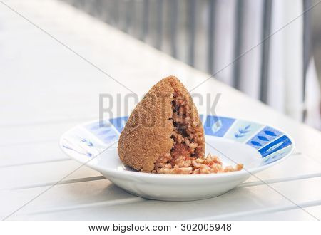 Sicilian Snack, Fried Ball Of Rice Arancino On A Plate, Tipical Street Food Of Sicily