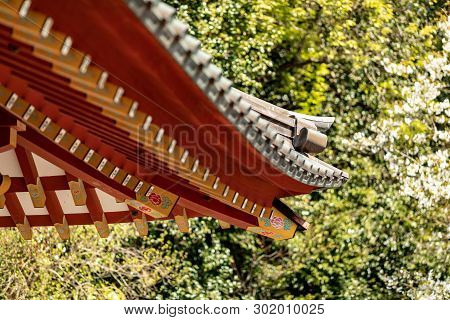 Japanese Traditional Architecture. The Elegant Construction Of The Japanese Temple Of Red And Gold B