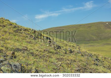 Picturesque Hill Against The Blue Sky. Serenity