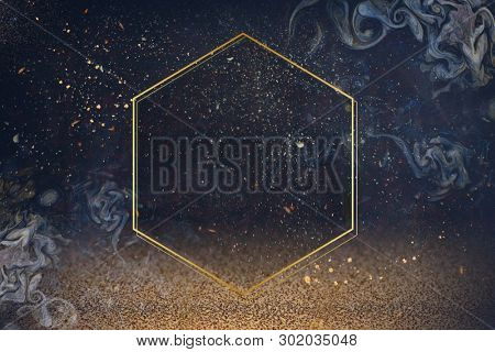 Giolden hexagon frame on an abstract background