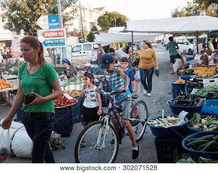 Tasucu, Mersin Province, Turkey - May 2019. Children And Women On The Turkish Market