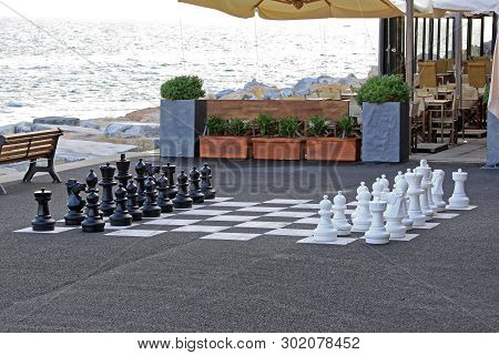 Outdoor Chess Game At Big Chequer Board