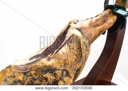 Spanish Delicatessen Dry Cured Meat Ham, Whole Leg, Jamon Iberico Bellota On Jamonero Stand Selectiv