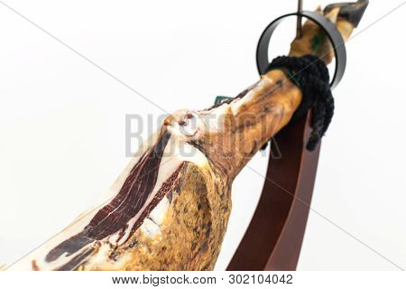 Spanish Delicatessen Dry Cured Meat Ham, Whole Leg, Jamon Iberico Bellota On Jamonero Stand Selectiv