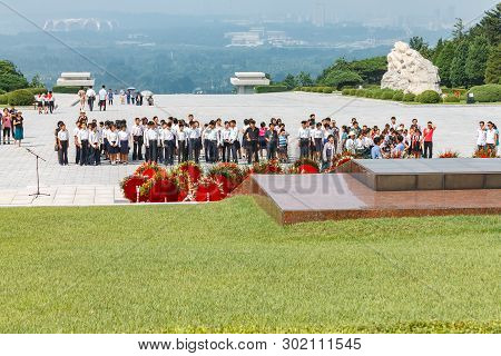 Pyongyang, North Korea-july 27, 2014: Korean Students At The Memorial Cemetery Of Revolutionaries In