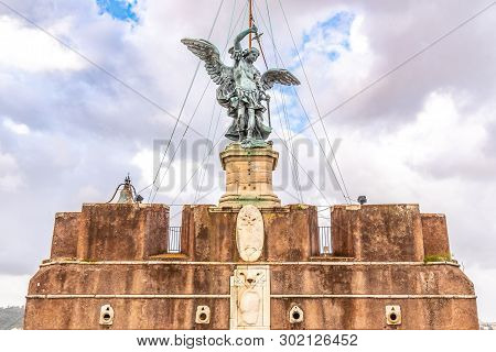 Bronze Statue Of Michael The Archangel On The Top Of The Castel Santangelo, Rome, Italy