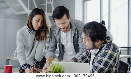Group Young Coworkers Together Discussing Creative Project During Work Process Modern Colleagues In 