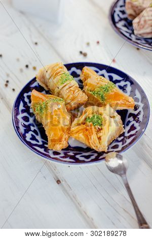 Asian Dessert Baklava Or Pahlava On A Traditional Oriental Plate, Great Image For Your Needs.