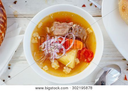 Top View Of Chorba Soup On White Table, Great Image For Your Needs.