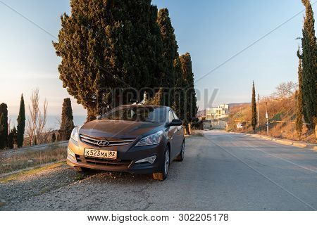 Sevastopol, Republic Of Crimea - March 23, 2019: The Car Hyundai Solaris Is Parked In Nature. Giad A