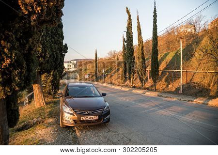 Sevastopol, Republic Of Crimea - March 23, 2019: The Car Hyundai Solaris Is Parked In Nature. Giad A