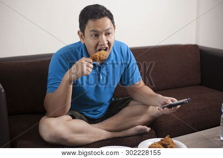 Asian Man Watch Tv