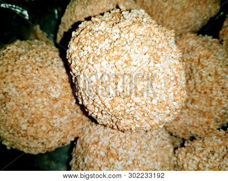 A Picture  Of Amaranth Ladoo With Dark Background