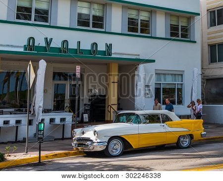 Miami Beach, Usa - February 26, 2019: Yellow And White Oldsmobile Rocket 88 Parked By Avalon Hotel O
