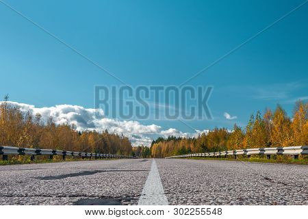 The Highway Through The Autumn Wood In Sunny Day, Mari El, Russia, 88k-002