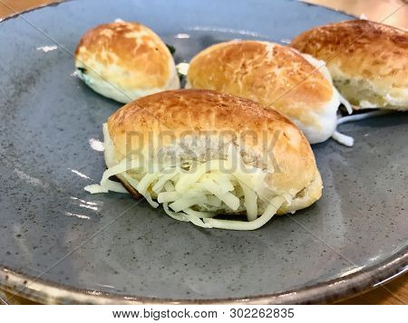 Turkish Sacakli Sakalli Or Mini Cheese Sandwich With Kashar Cheese Slices. Traditional Fast Food.