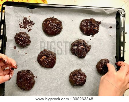 Raw Cookies On Oven Tray Ready To Cook / Chocolate Brownie With Walnut Cookie.