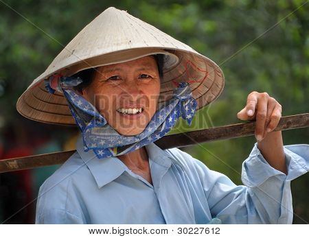 Žena prodavače ovoce, Ho Či Minovo město, Vietnam