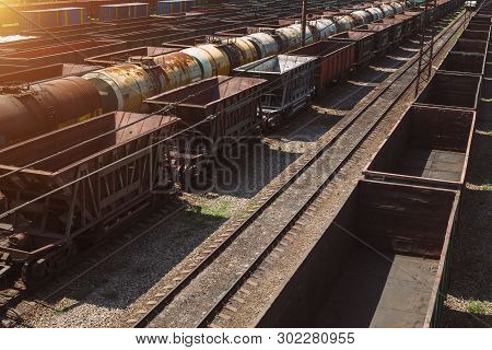 Freight Trains On City Cargo Terminal. Railways In Train Parking. Arain Arrived At The Station. Carg