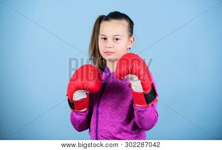Girl Cute Boxer On Blue Background. With Great Power Comes Great Responsibility. Contrary To Stereot