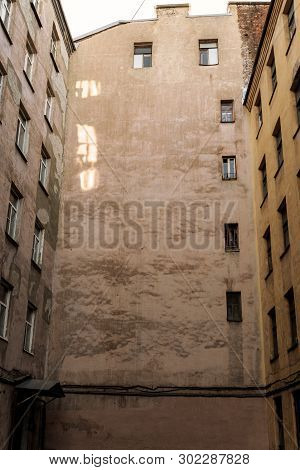Typical Yard View Of Old City Building Saint-petersburg, Russia. Old Courtyard Well. Bottom View