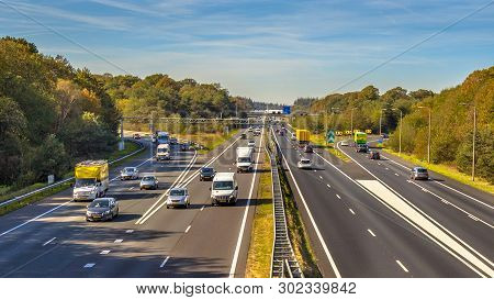 Afternoon Motor Traffic On The A12 Motorway Seen From Above. This Is One Of The Bussiest Highways In
