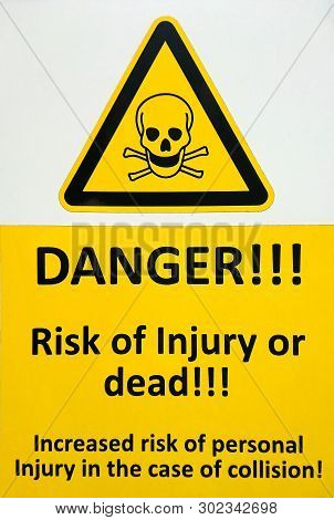 Danger, Risk Of Injury Or Dead, The Surface Of Yellow Warning With Black Colored Letters Sign. Conto