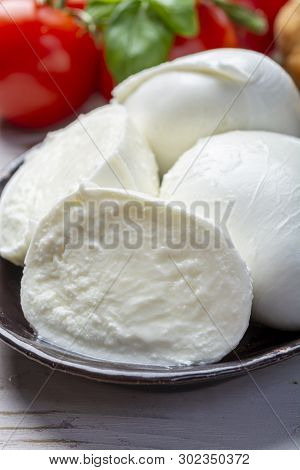 Balls And Pieces Of Buffalo Mozzarella, Soft Italian Scheese Made From The Milk Of Italian Mediterra