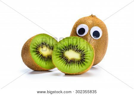 Sad Kiwi Fruit With Googly Toy Eyes And One Fruit Cut In Two Halves, Isolated On White Background. C