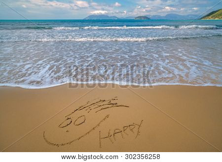 Happy Face Drawn On Sand  Gerakas Beach In Summer, Zante Island, Greece