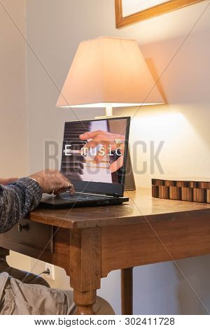 Laptop Screen On An Emusic Site, Download Or Music Lesson