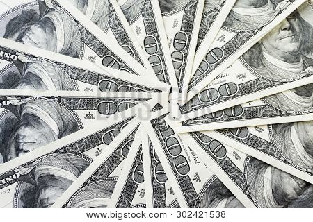 Crolled Stack Of 100 Dollar Bills, Close Up Banknote