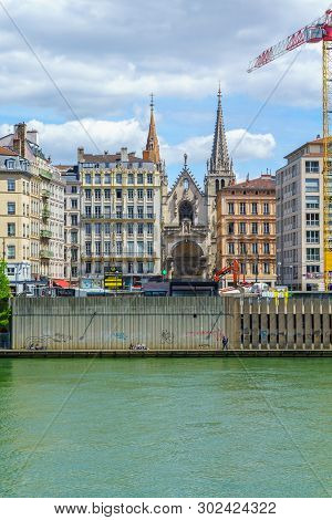 Lyon, France - May 10, 2019: The Saone River, Colorful Houses And Saint-nizier Church, In Lyon, Fran