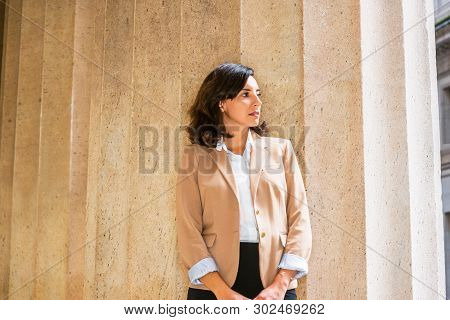 Portrait Of Young American Businesswoman In New York City, Wearing Beige Color Blazer, Unbuttoned, W
