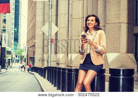 Young American Business Woman Traveling, Working In New York City, Wearing Beige Blazer, Black Short
