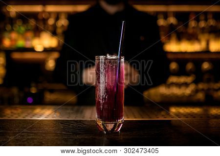 Close-up Of Purple Cocktail On Bar Counter